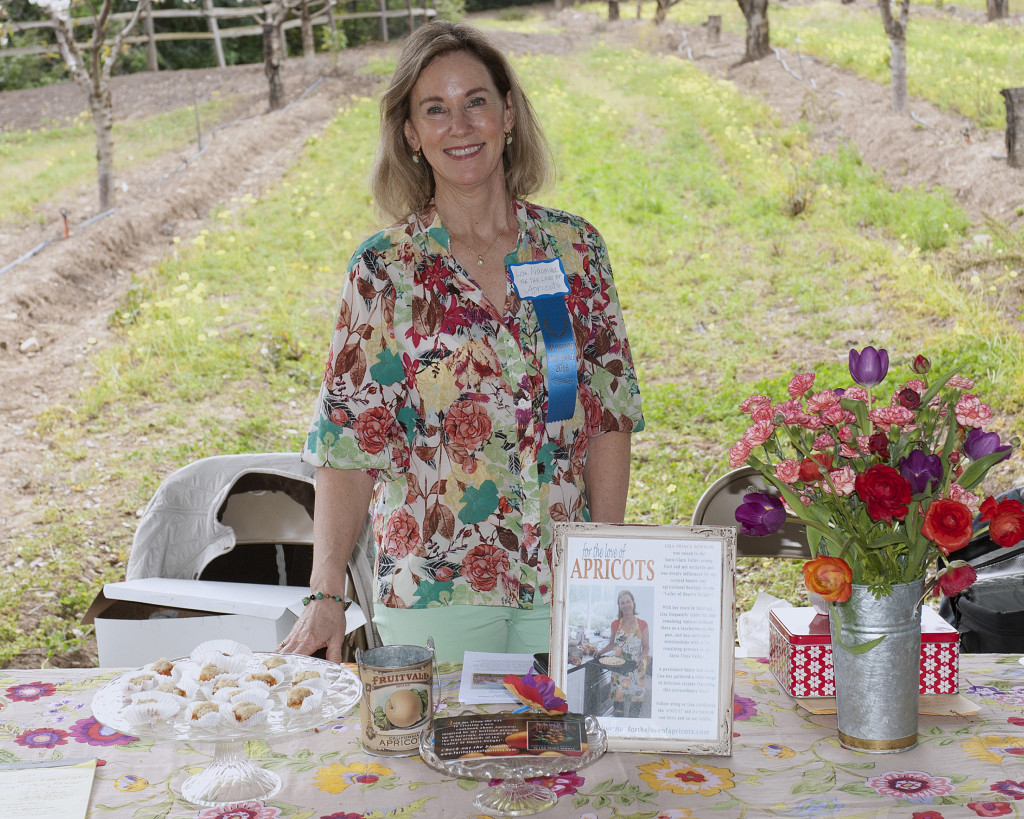 Lisa hosting For the Love of Apricots table at the Saratoga Blossom Festival