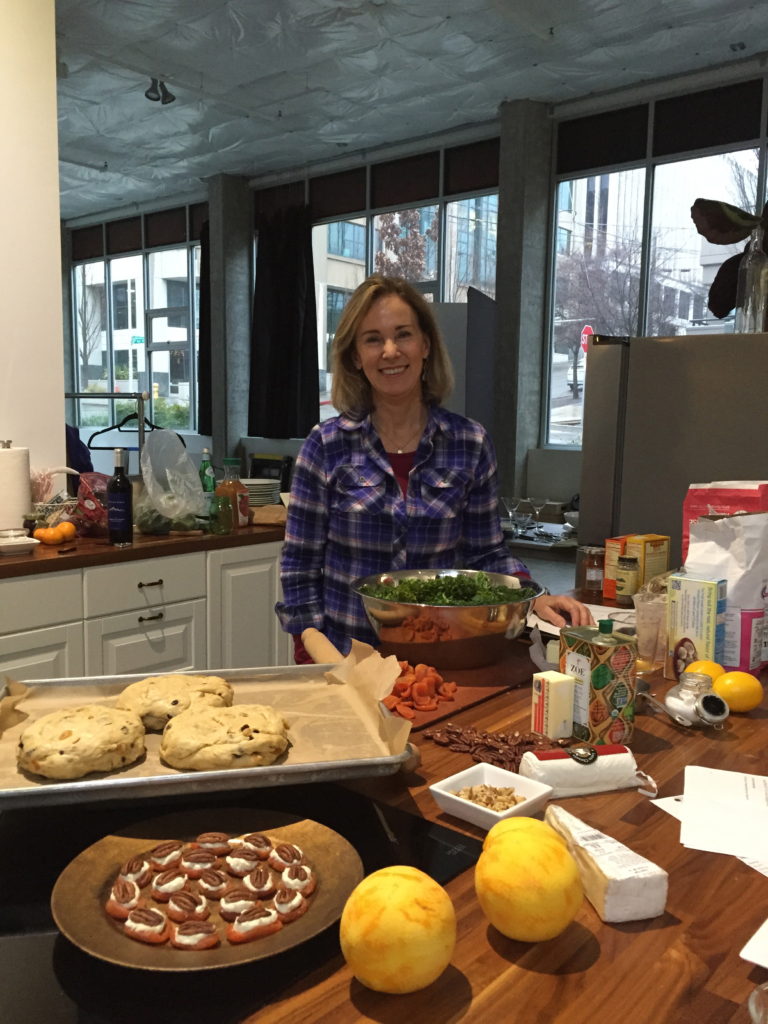 Lisa in the Greenhouse Studio's kitchen