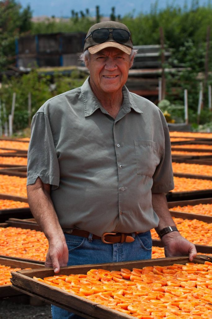 Andy with drying apricots